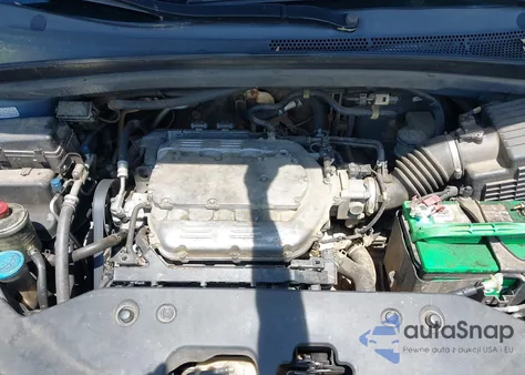 2010 Honda Odyssey Touring z USA, uszkodzony, nr VIN 5FNRL3H93AB058240